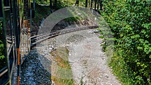 Unique rack railway to the top of Schneeberg mountain in the Austrian Alps. View from the train photo