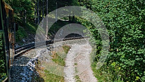Unique rack railway to the top of Schneeberg mountain in the Austrian Alps. View from the train. photo