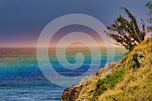 Unique rainbow on the ocean at Honolua Bay on Maui.