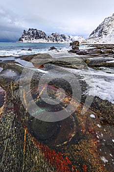 The unique rock formation - the dragon eye at Uttakleiv Beach, Lofoten, Norway