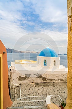 Unique Santorini architecture, church with blue cupola