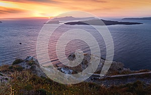 Unique sea view  to volcano island Nea Kameni at sunset,   Santorini, Greece