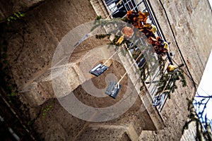 Unique Christmas Decoration: Cassette Tape Hanging from Christmas Branch in a Typical Polignano a Mare Street photo