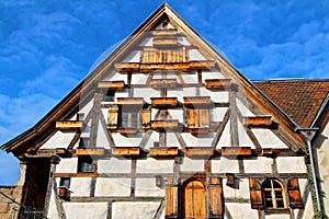 Unique style of old Fachwerkhaus building by blue sky