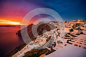 Unique Sunset Colors at Santorini Island,  Greece, one of the most beautiful travel destinations of the world