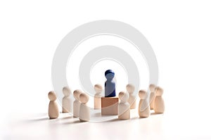 Unique toy figure in front of others. Concept of business leadership for team