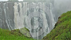 The unique Victoria Falls collapses into the gorge with powerful streams. photo