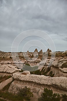 Unique volcanic landscape and geologic rock formations in Cappadocia, Turkey