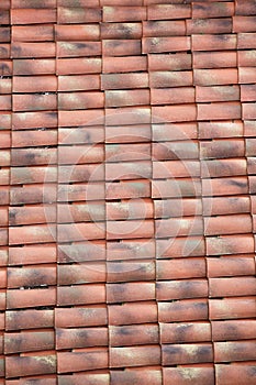 Unique, weathered terracotta roof background