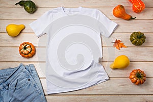 Unisex T-shirt mockup with pumpkins photo