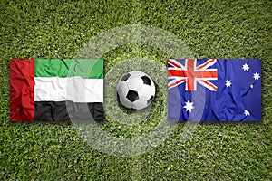 United Arab Emirates vs. Australia flags on soccer field