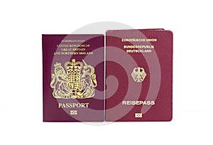 United Kingdom and German biometric passports on a white background