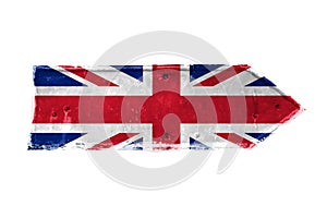 United Kingdom UK flag painted over arrow shape from a rusty and grunge metal iron plate