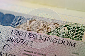 United Kingdom UK Multiple Entry Visa Type C sticker in the passport. Macro photo