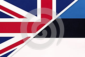 United Kingdom vs Estonia national flag from textile. Relationship between two european countries