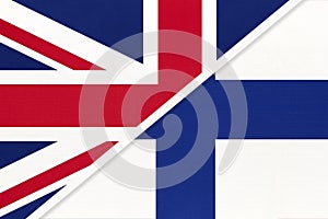 United Kingdom vs Finland national flag from textile. Relationship between two european countries