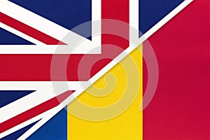 United Kingdom vs Romania national flag from textile. Relationship between two european countries