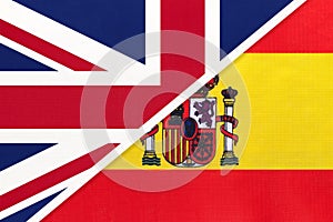 United Kingdom vs Spain national flag from textile. Relationship between two european countries