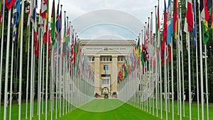 United Nations building with flags, Geneva, Switzerland, zoom in, 4K