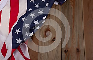 United Sates of America flag fabric on wooden background