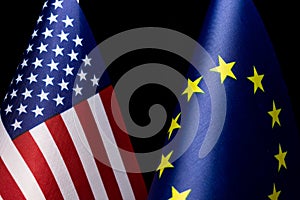 United States of America and European Union flags, concept of bilateral relations, friendship or conflict