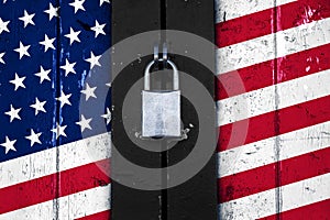 United states of america flag on a door with a padlock, protect