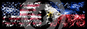 United States of America, USA vs Philippines, Filipino New Year celebration sparkling fireworks flags concept background.