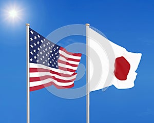 United States of America vs Japan. Thick colored silky flags of America and Japan. 3D illustration on sky background. -