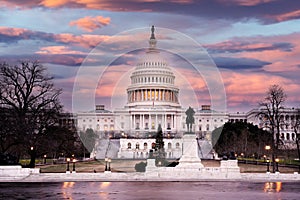 United States Capitol Building with colorful sunset sky