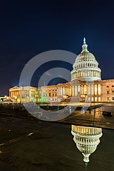 The United States Capitol Building at night in Washington, DC