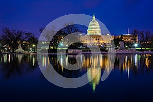 The United States Capitol at night, in Washington, DC