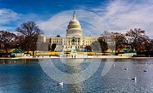 The United States Capitol and reflecting pool in Washington, DC.