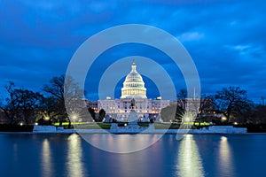 The United States Capitol with reflection at night, Washington DC, USA