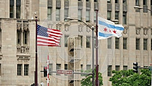 United States and Chicago Flags Waving on Michigan Bridge