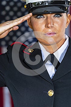 A United States Female Marine Posing In A Military Uniform
