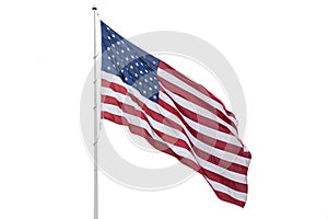 United States flag on a pole waving isolated on white background