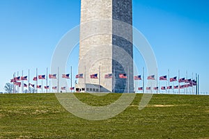 United States flags around base of Washington Monument - Washington, D.C., USA