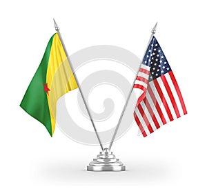 United States and French Guiana table flags isolated on white 3D rendering