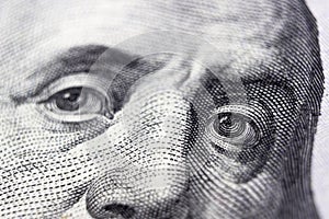 United states hundred dollars money bill, Benjamin Franklin`s eyes from a fragment of new 100 dollar