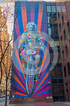 United States New York Street Art Albert Einstein on a bicycle technicolor mural created by Brazilian artist Eduardo Kobra