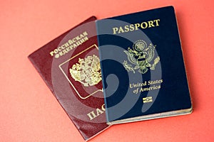 United States passport on top of a Russian passport