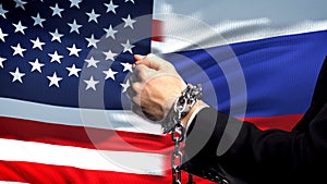 United States sanctions Russia, chained arms, political or economic conflict