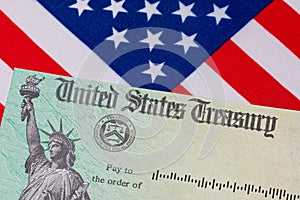 United States Treasury check and American flag