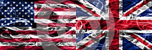 United States vs United Kingdom smoke flags concept placed side