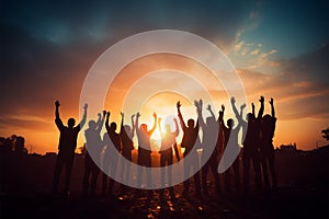 United team Silhouettes raise hands in joyous celebration together