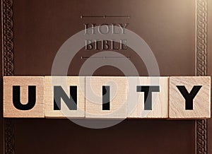 Unity Spelled in Blocks on a Leather Holy Bible