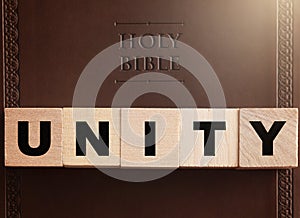 Unity Spelled in Blocks on a Leather Holy Bible photo