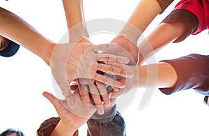 Unity and teamwork Concept: Group of friends hands together. Top view of Asian young people putting their hand together as Friends