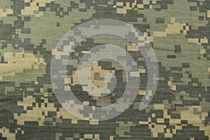 Universal camouflage pattern, army combat uniform digital camo, USA military ACU macro closeup, detailed large rip-stop fabric photo