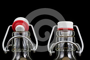 Universal closure of a beverage bottle. Airtight cap closing transparent glass container.